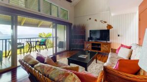 The living room and lanai at Pali Ke Kua at Princeville #217