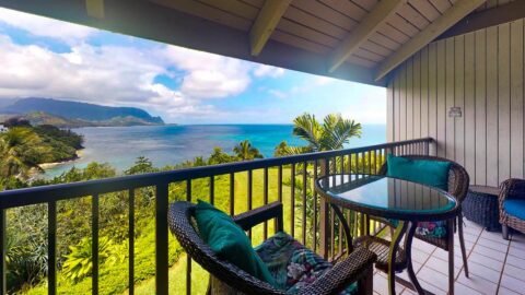 The covered lanai with ocean views at Pali Ke Kua at Princeville #217