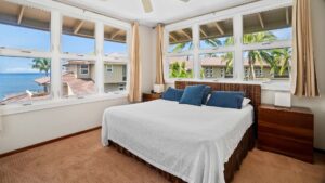 The master bedroom suite at Whalers Cove #230, with ocean views