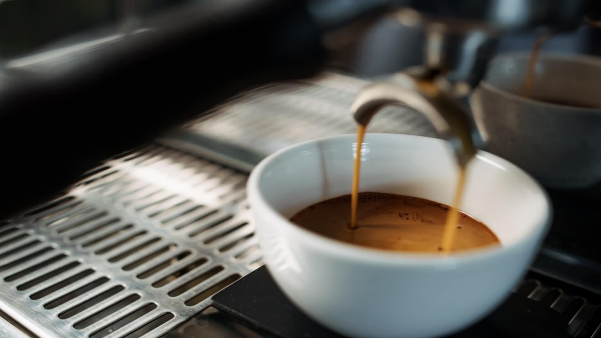 An espresso being poured at a Kauai coffee shop